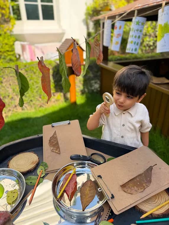 Children learning at Curiosity Cottage, Forest Oasis Nursery