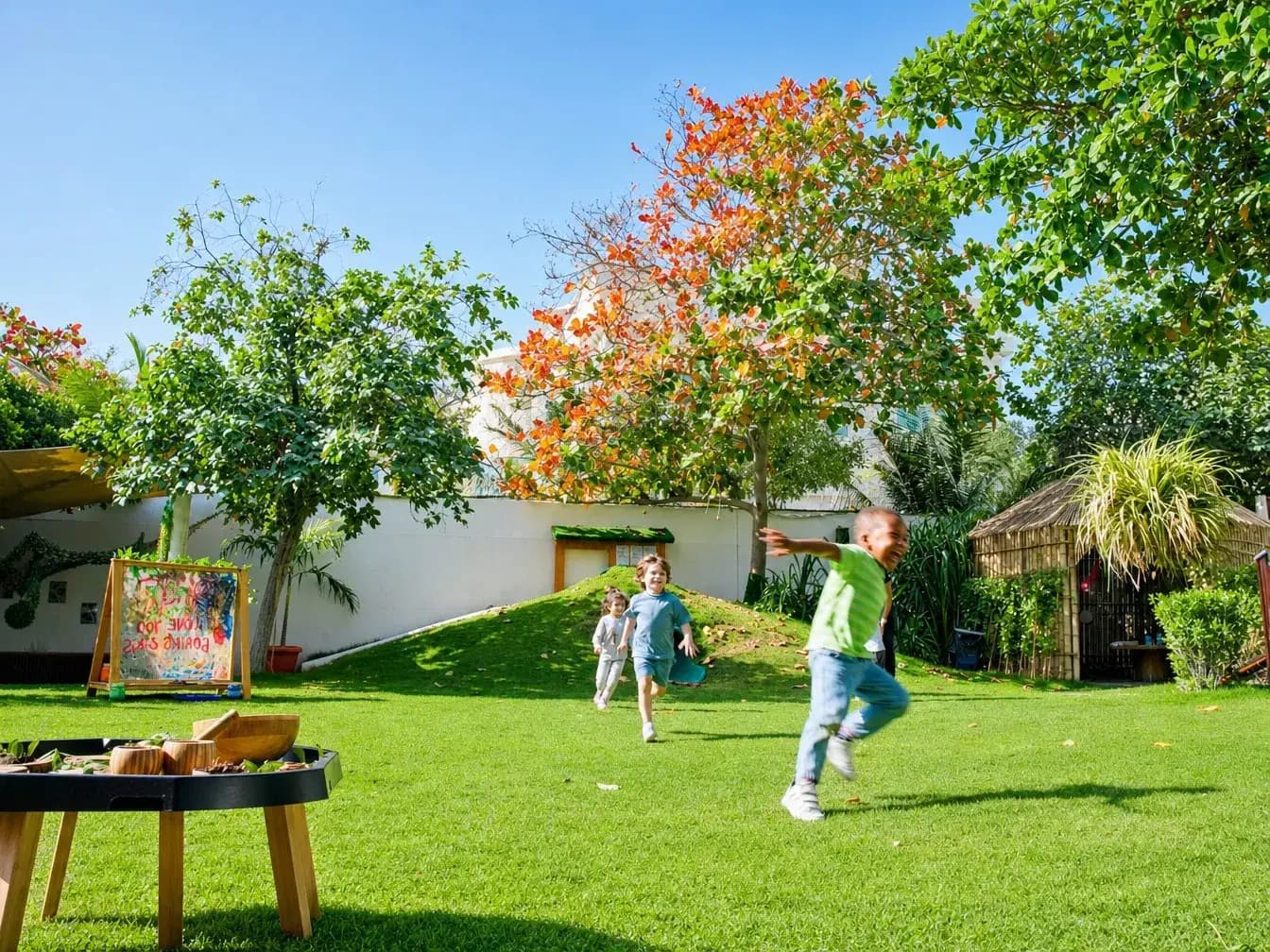 Children playing outdoors at Forest Oasis Nursery